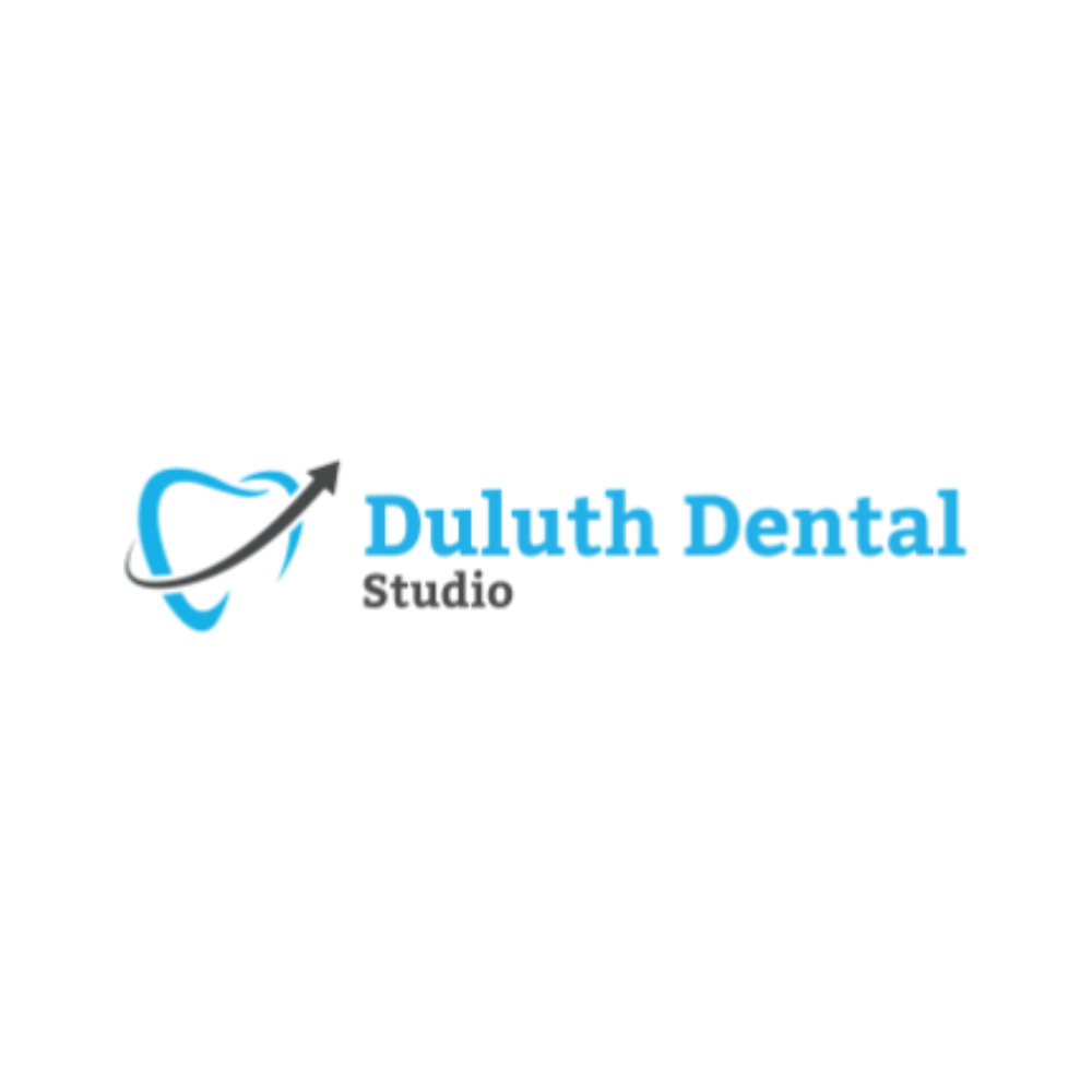 Dentist providing patient care at Duluth Dental Studio